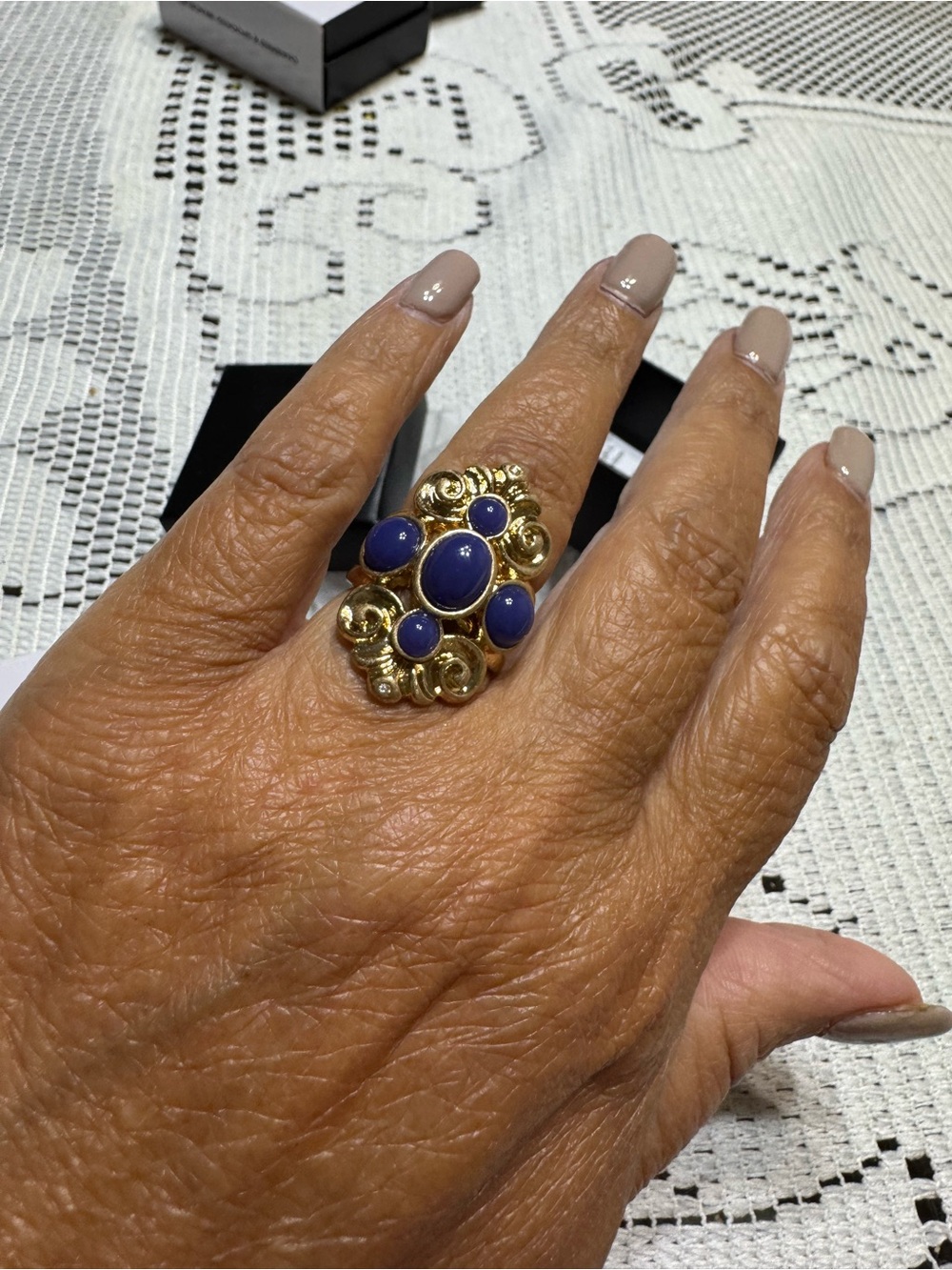 Elegant Gold-Tone Ring with Deep Blue Cabochons